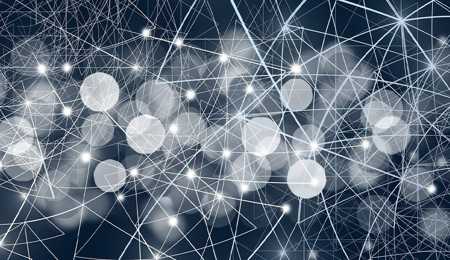 Abstract network background with white lines and nodes connecting over a dark blue gradient. Bright light spots scattered throughout, evoking the assistance of guiding lights.