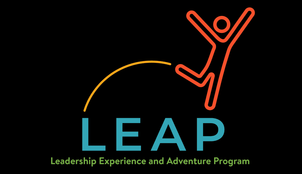 Logo of leap, acronym for leadership experience and adventure program, featuring a stylized figure leaping over an arc, symbolizing the inclusive spirit embracing individuals with disabilities.