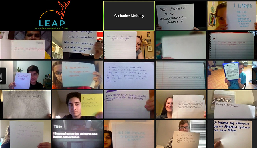 A collage of multiple video call screens showing people holding up handwritten signs with various messages about disability assistance.