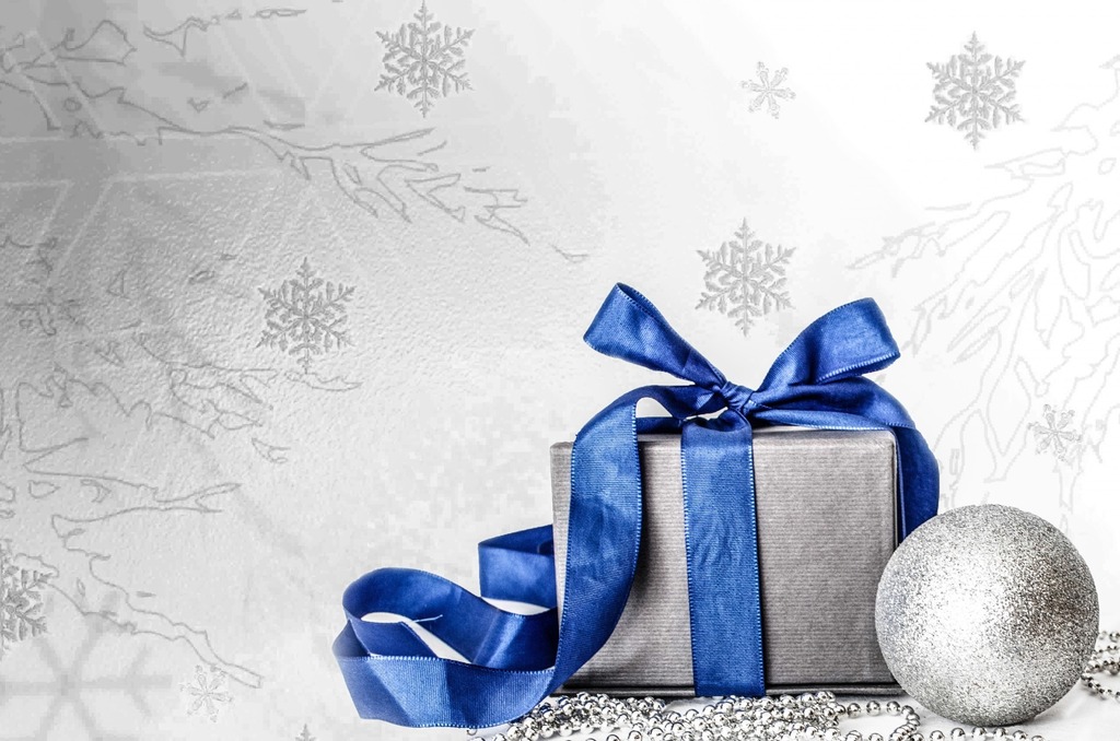 silver package with blue ribbon